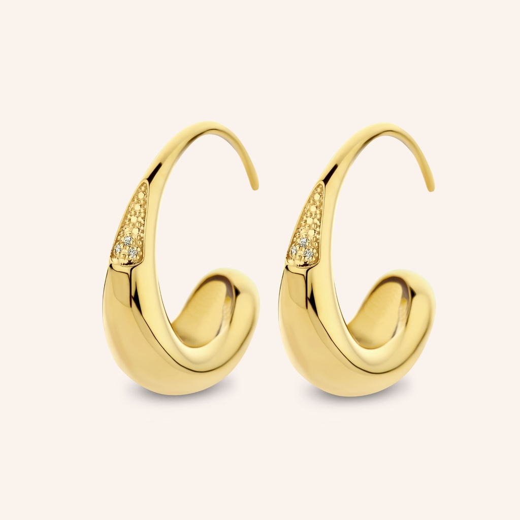 Inspired by the gooey, rich and delicious texture of sweet honey, these large hoops are handset with 3x natural white diamonds – a strikingly strong look, ﬁt only for the Queen bees.